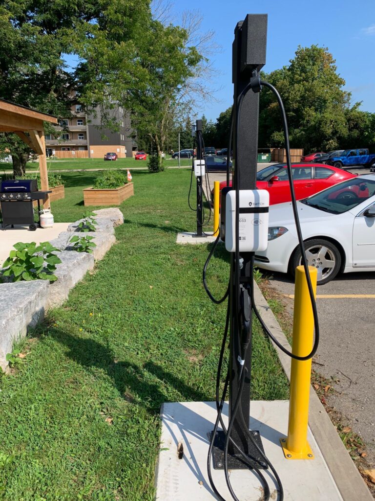 SWTCH EV Chargers outside near community green space